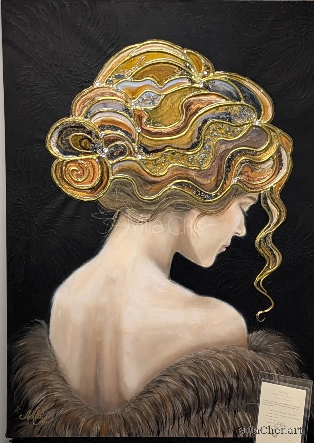 Portrait of a woman in profile with layered sculptural gold hair